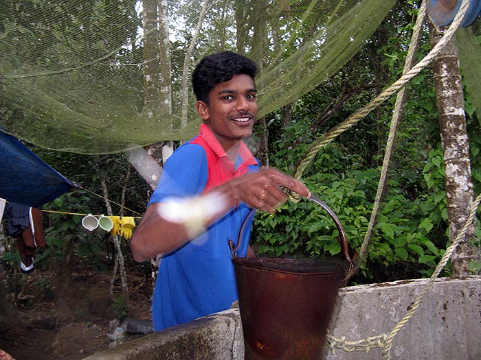 taking water from the well in Kerala